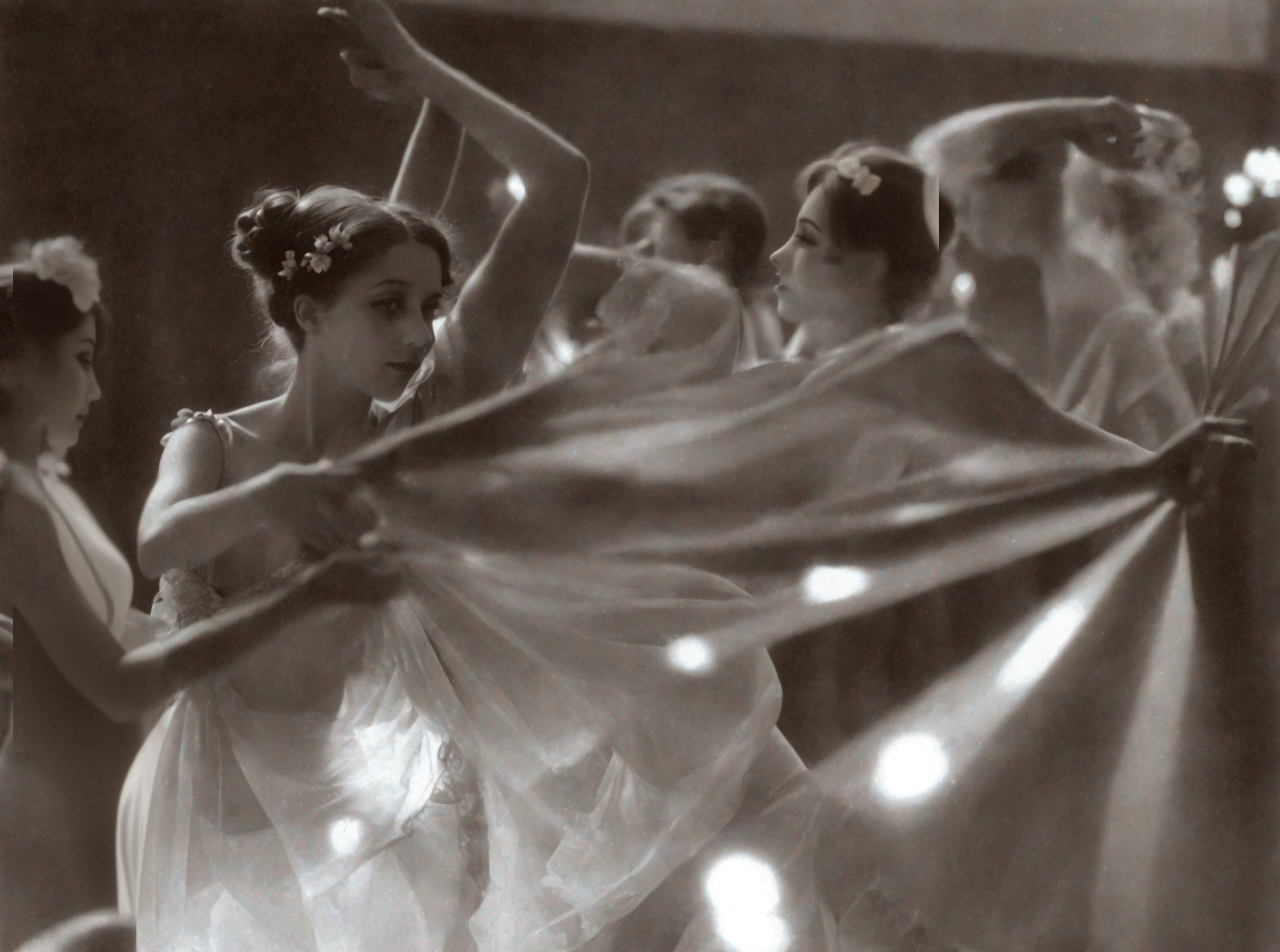 Vintage Black and White Photo of Elegant Women Dancing