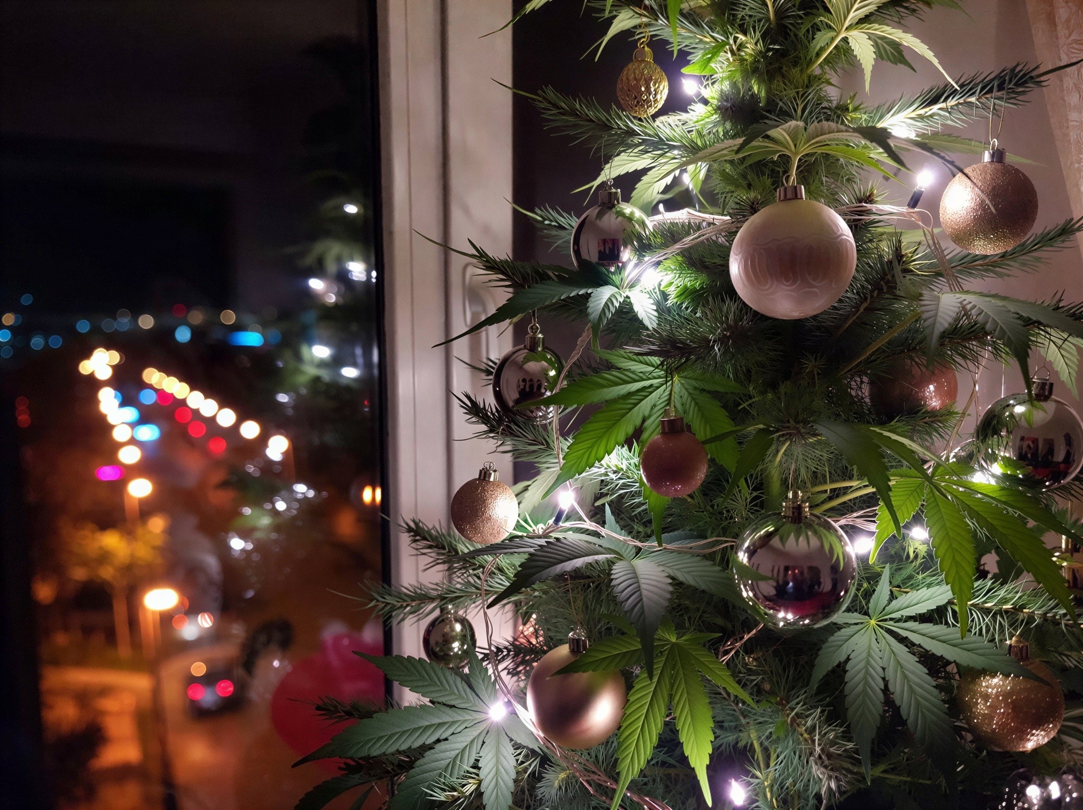 Ornate Christmas Tree with Cityscape Background