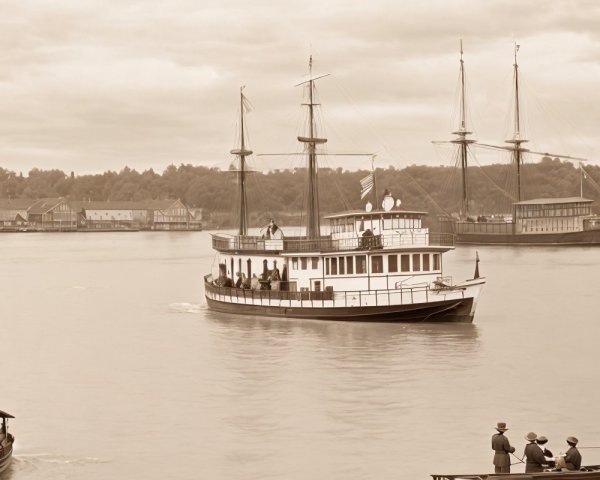 Vintage Steam-Powered Riverboat on Calm Waters