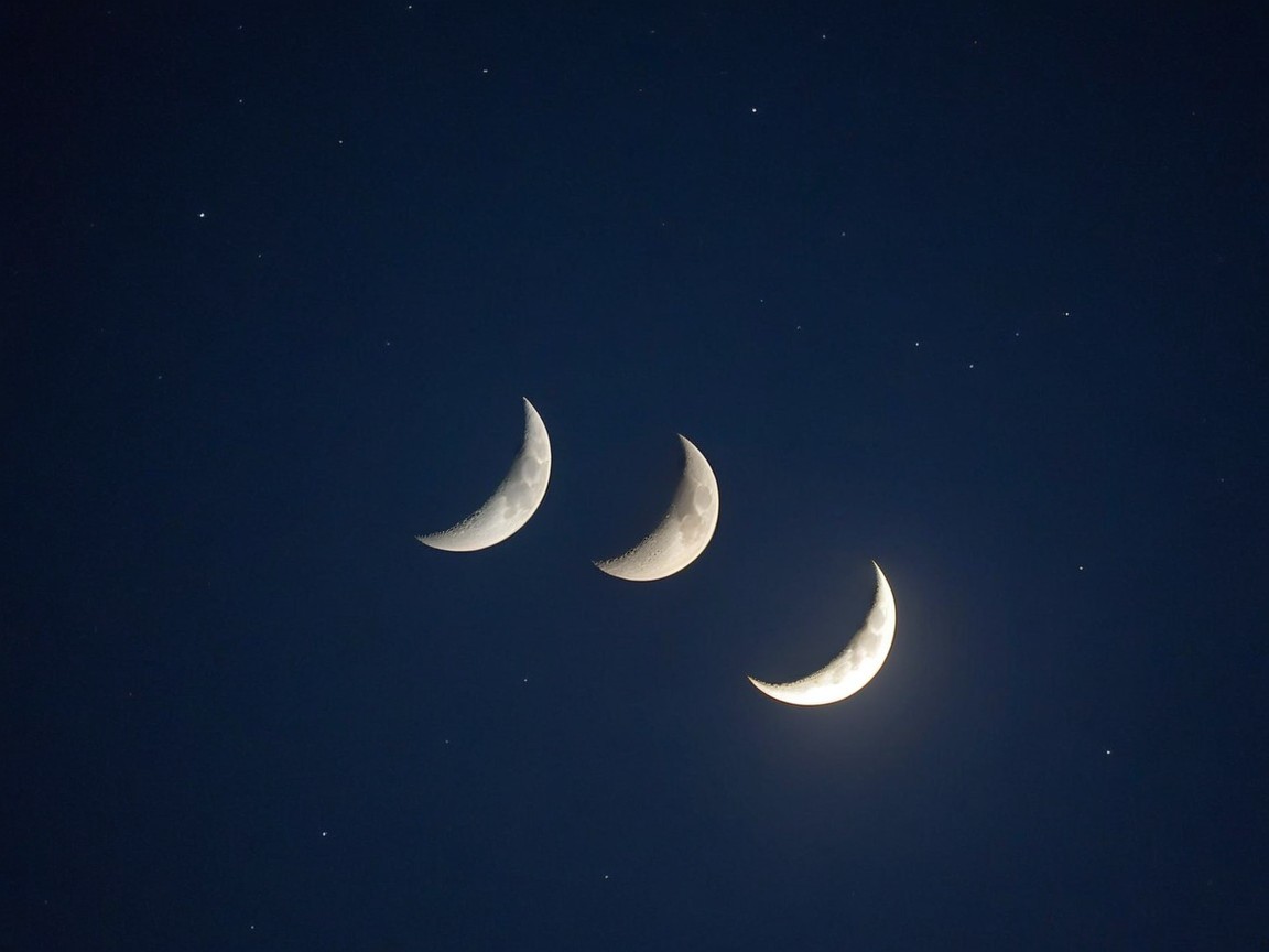 Serene Night Sky with Three Crescent Moons and Stars