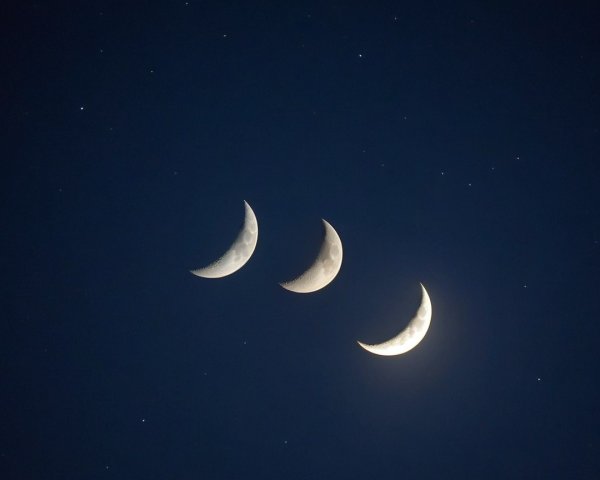 Serene Night Sky with Three Crescent Moons and Stars