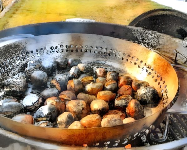 Grill Basket of Roasting Chestnuts Over Open Flame