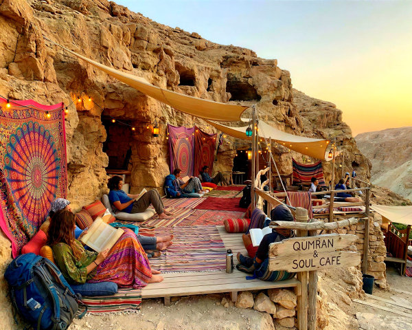 Bohemian Cafe in Rock Face at Sunset with Decor