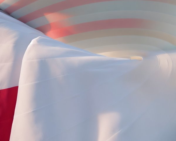 Abstract Curved Forms with Pastel Stripes and Red Accent