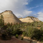 Vibrant autumn landscape with cliffs and fields