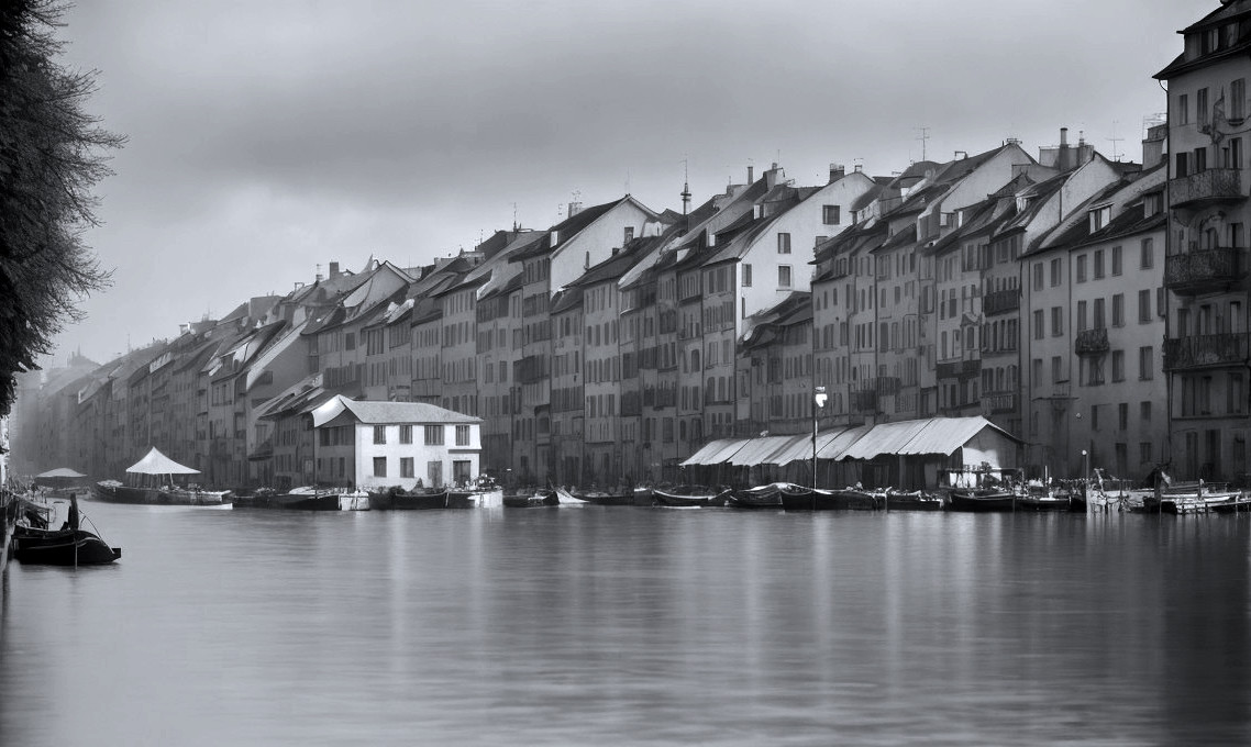 Monochrome River Scene with Old Buildings and Boats