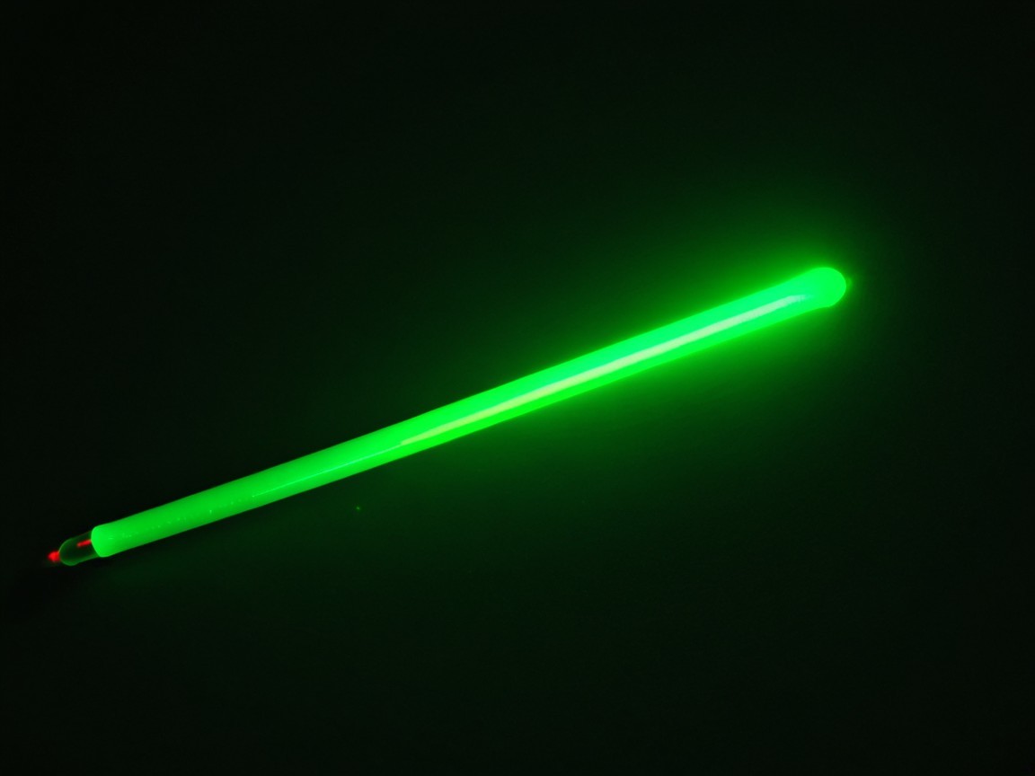 Glowing Green Light Stick on Dark Background