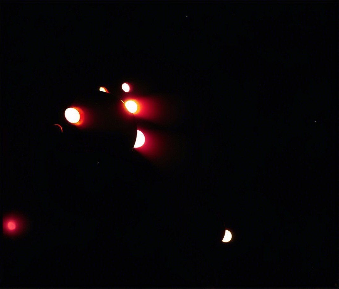 Cosmic Scene with Celestial Bodies in Vivid Colors