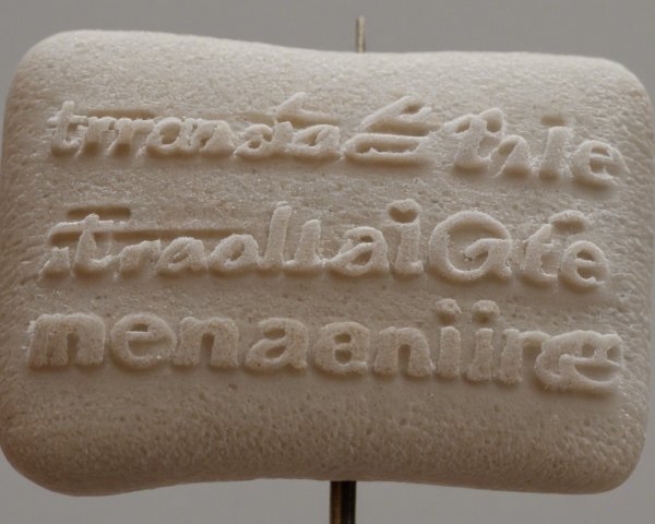 Textured Foam Piece with Abstract Carved Lettering