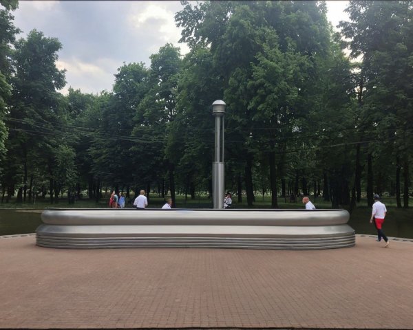 Modern Metallic Structure in Urban Park Setting