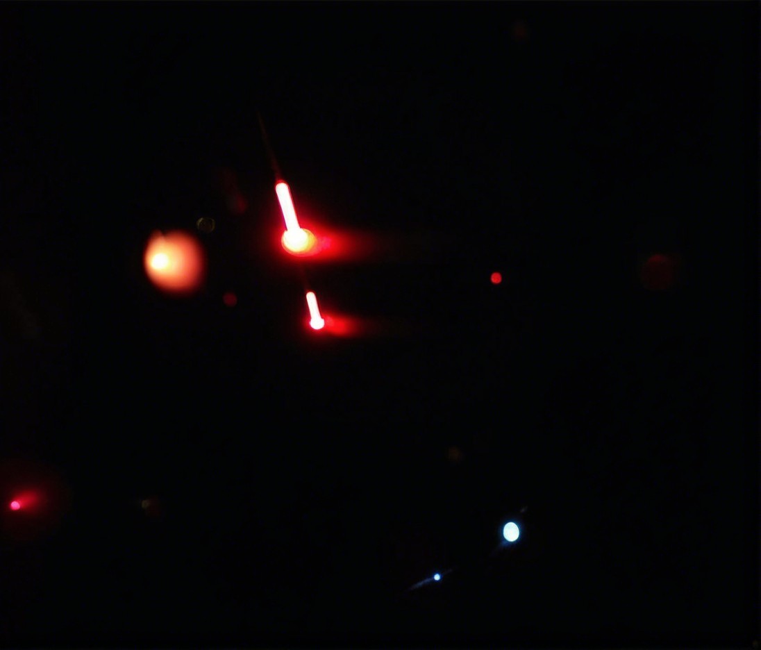 Abstract depiction of glowing orbs in dark space