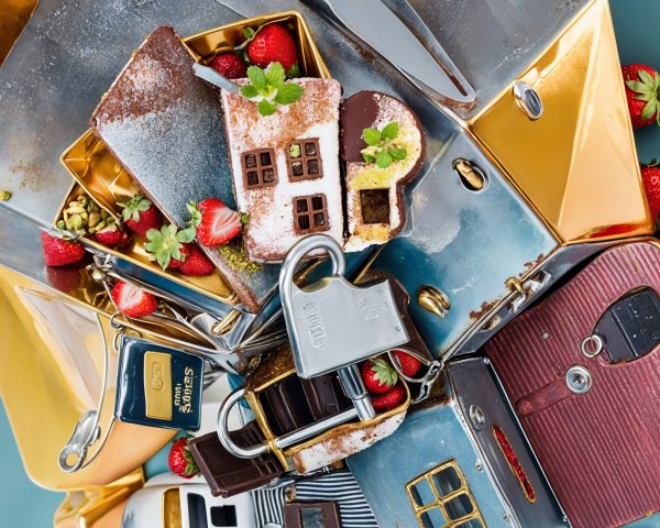 Miniature Cake Houses with Strawberries and Utensils