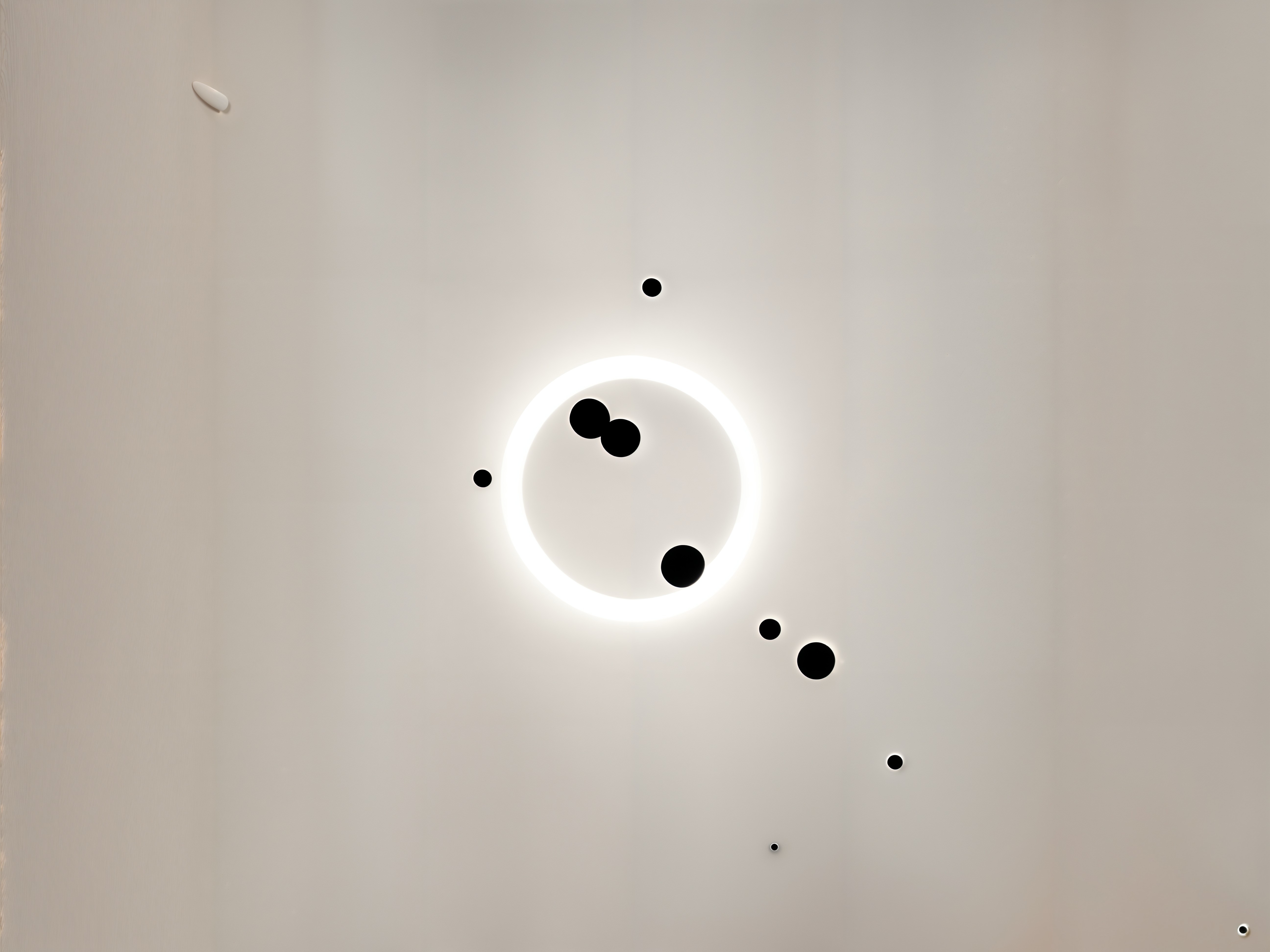 Minimalist Black Circles with White Ring on Neutral Background