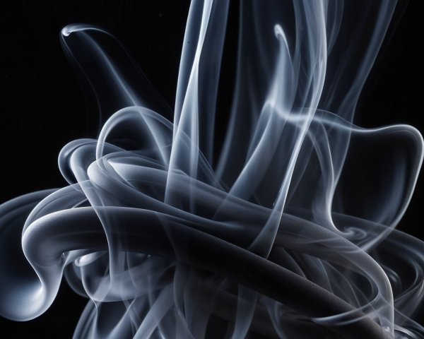 Swirling Smoke Abstract Art on Black Background