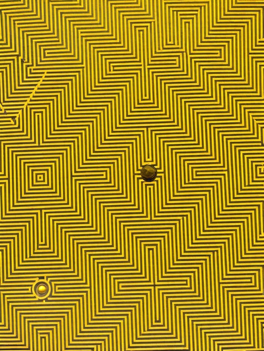 Vibrant Yellow Background with Zigzag and Square Pattern