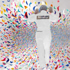 Model in White Outfit Against Abstract Colorful Background