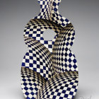 Abstract Sculpture with Checkerboard Pattern and Depth