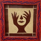 Artwork of Hands Cradling Sailboat on Gold Background