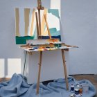 Minimalist Art Studio with Colorful Abstract Painting