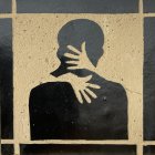 Textile Artwork with Stylized Figure in Neutral Tones