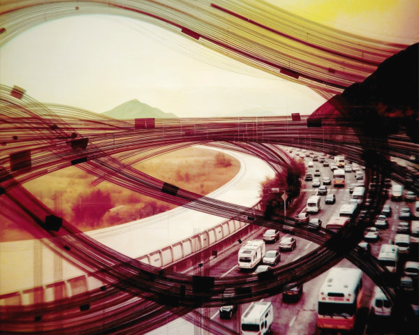 Busy highway scene with abstract flowing lines and colors