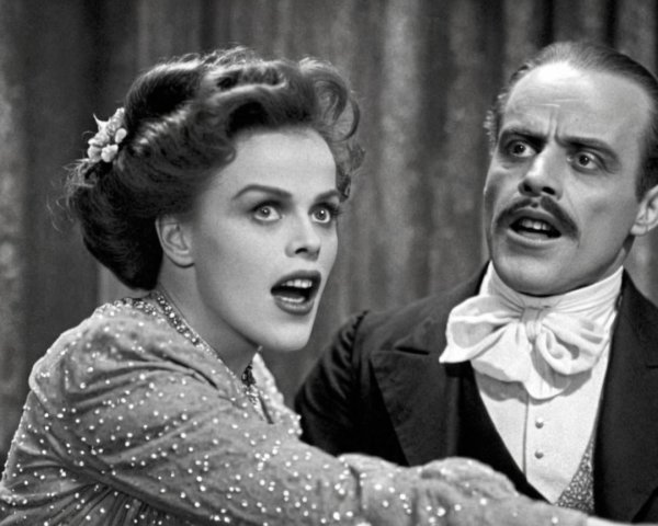 Dramatic Black-and-White Scene of Shocked Couple