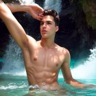 Toned Physique Posing by Waterfall in Clear Water