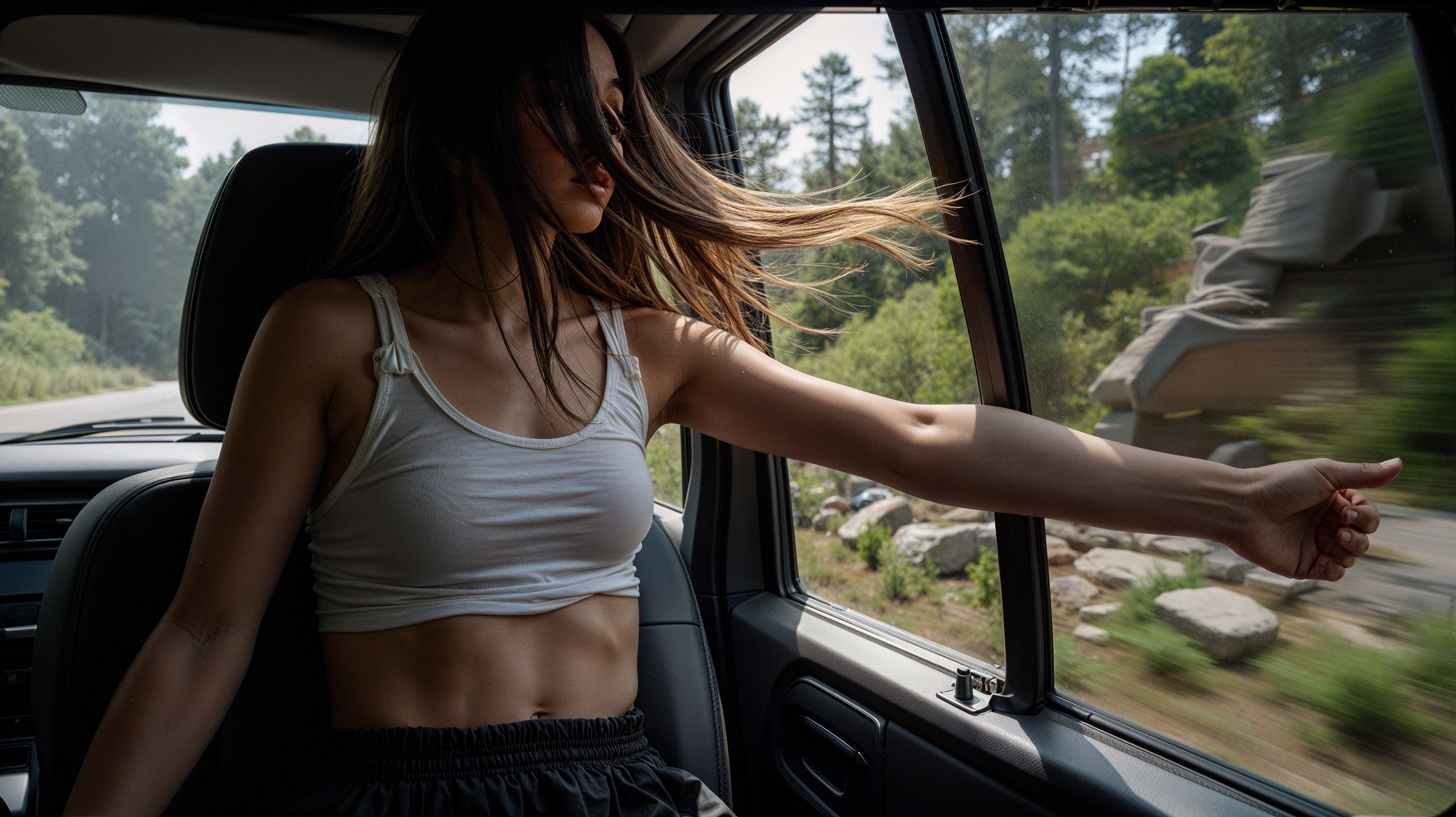 Young Woman Enjoying Scenic Drive in Car Backseat