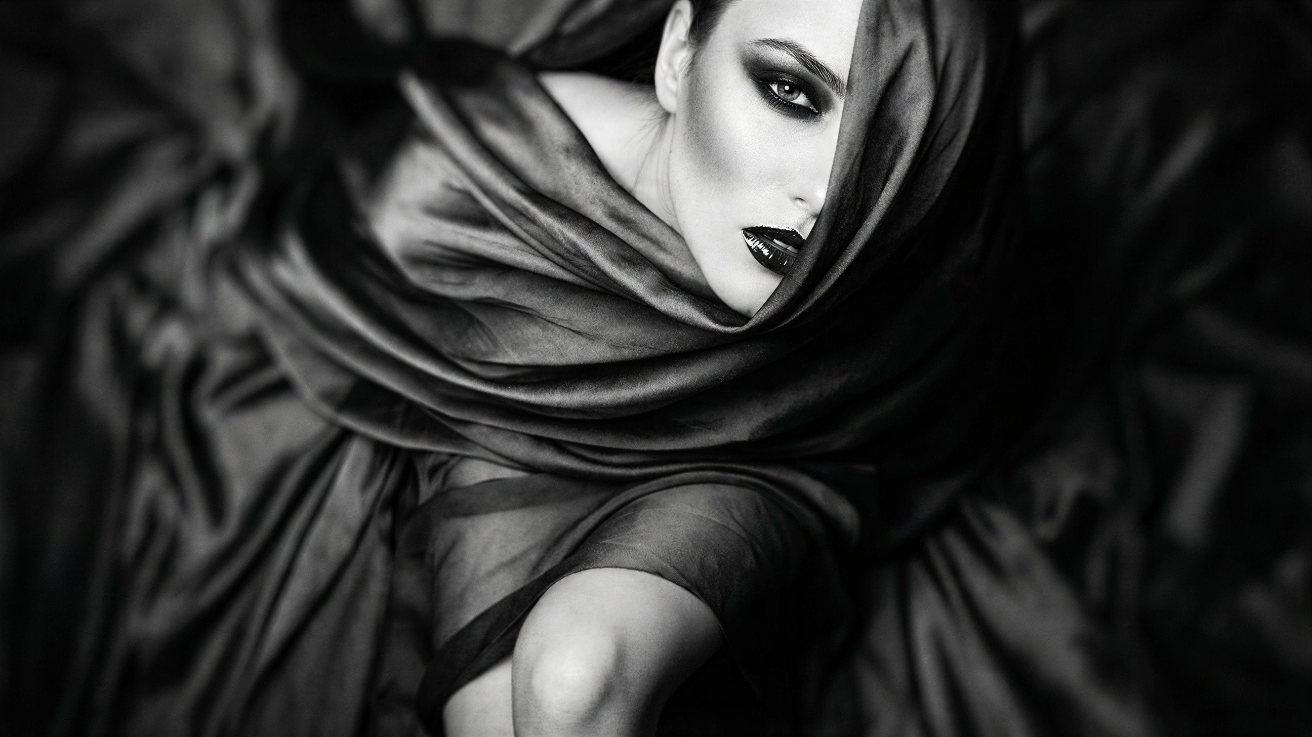 Monochromatic portrait of a woman with dark makeup