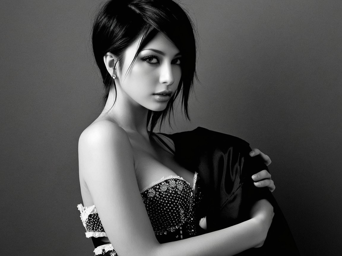 Black and White Portrait of a Woman in Fashionable Attire