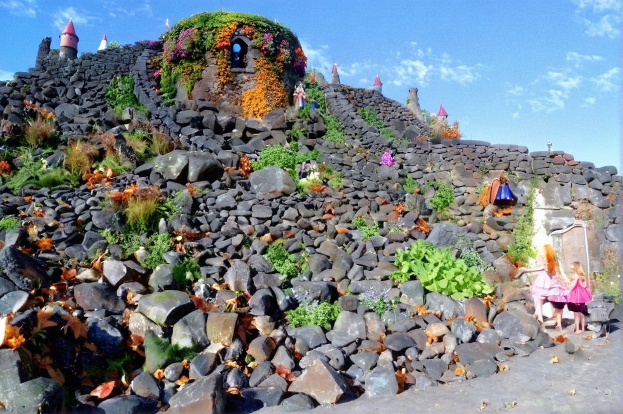 Whimsical Hillside with Boulders and Colorful Houses