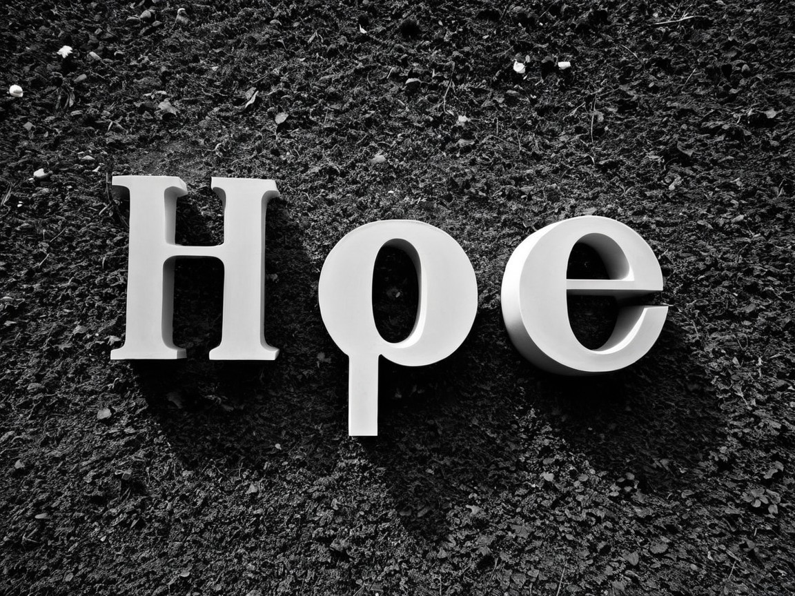 Three-Dimensional "Hope" Letters on Black Background