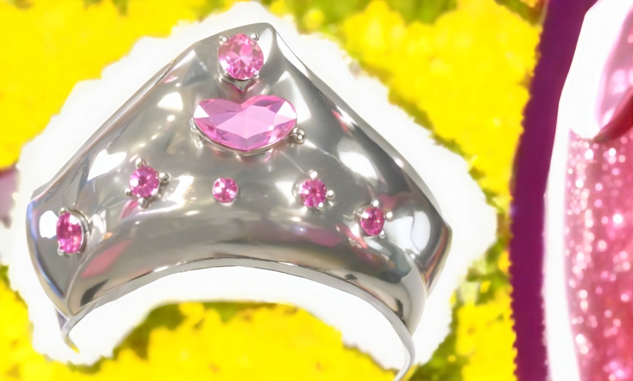 Silver Ring with Pink Gemstones and Floral Background