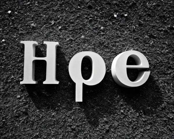 Three-Dimensional "Hope" Letters on Black Background