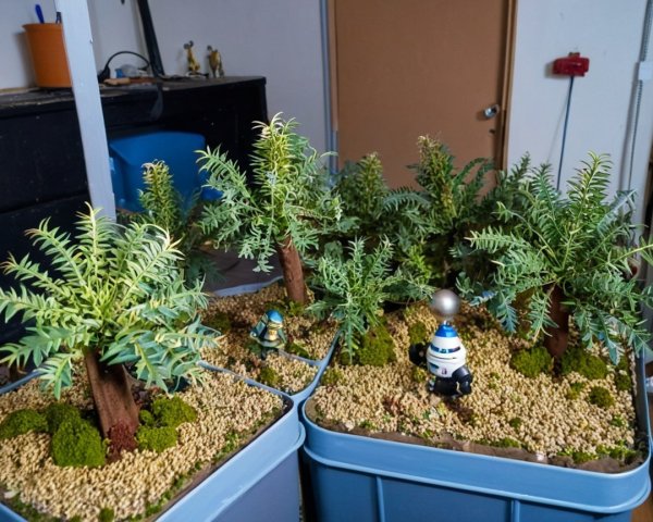 Vibrant Miniature Landscape with Greenery and Figurines