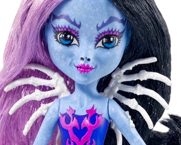 Unique doll with blue complexion and skeletal wings