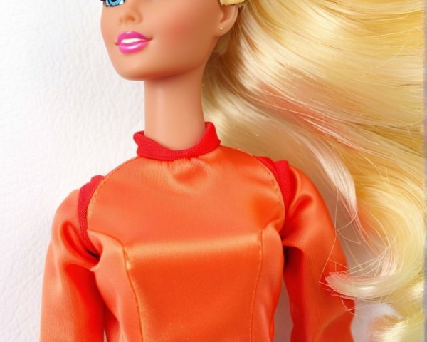 Stylish doll with blonde hair and vibrant outfit