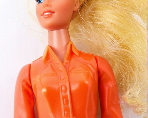 Stylish doll with blonde hair and vibrant outfit