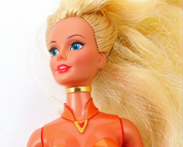Vibrant doll with blonde hair and orange outfit