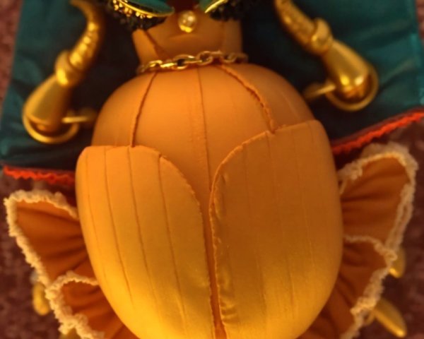 Close-Up of a Vibrant Doll in Elaborate Costume