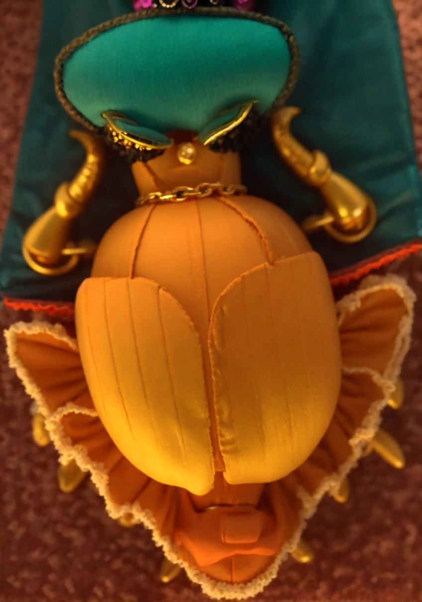 Close-Up of a Vibrant Doll in Elaborate Costume