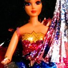 Vibrant Superhero Doll in Sparkling Costume