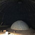 Circular Well with Illuminated Rocky Walls