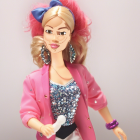 Stylish doll with blonde hair and pink highlights