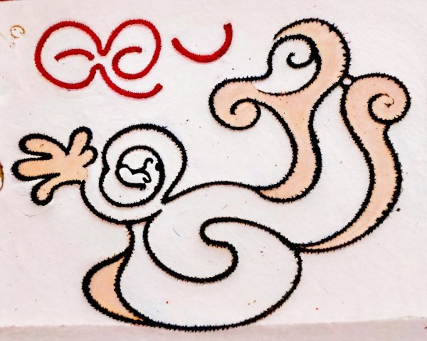 Textured White Surface with Cartoonish Creature Drawing