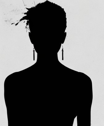 Silhouette of a Person with Elaborate Hairstyle and Earrings