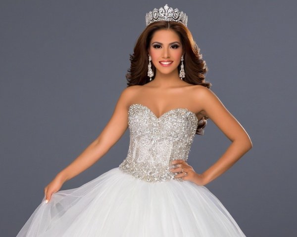 Elegant Young Woman in Strapless Ball Gown