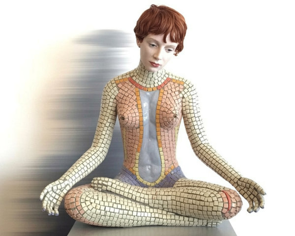 Sculptural Artwork of a Seated Female Figure in Mosaic