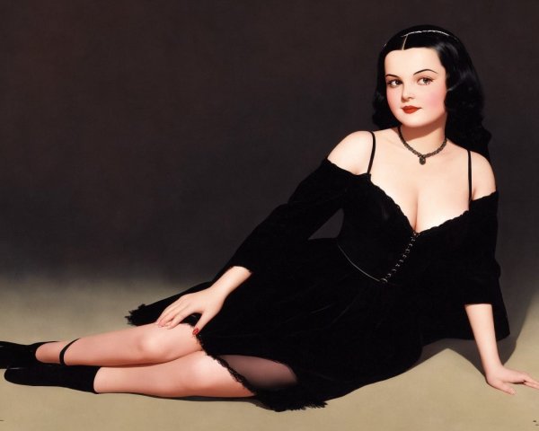 Glamorous Figure in Black Off-the-Shoulder Dress