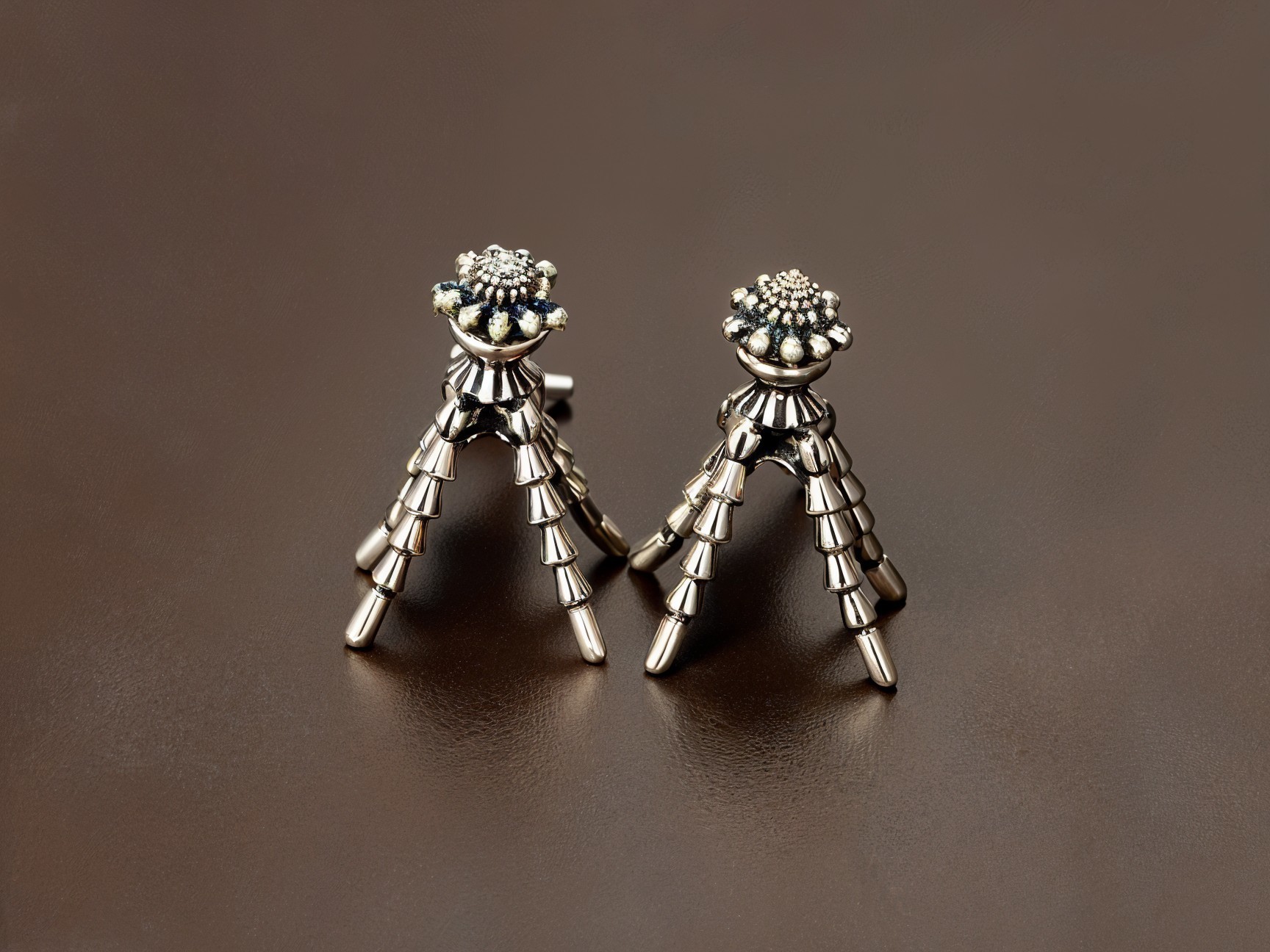 Silver Tripod Earrings with Intricate Detailing
